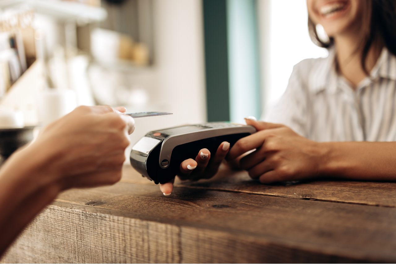 Payment by credit card in the flower shop.